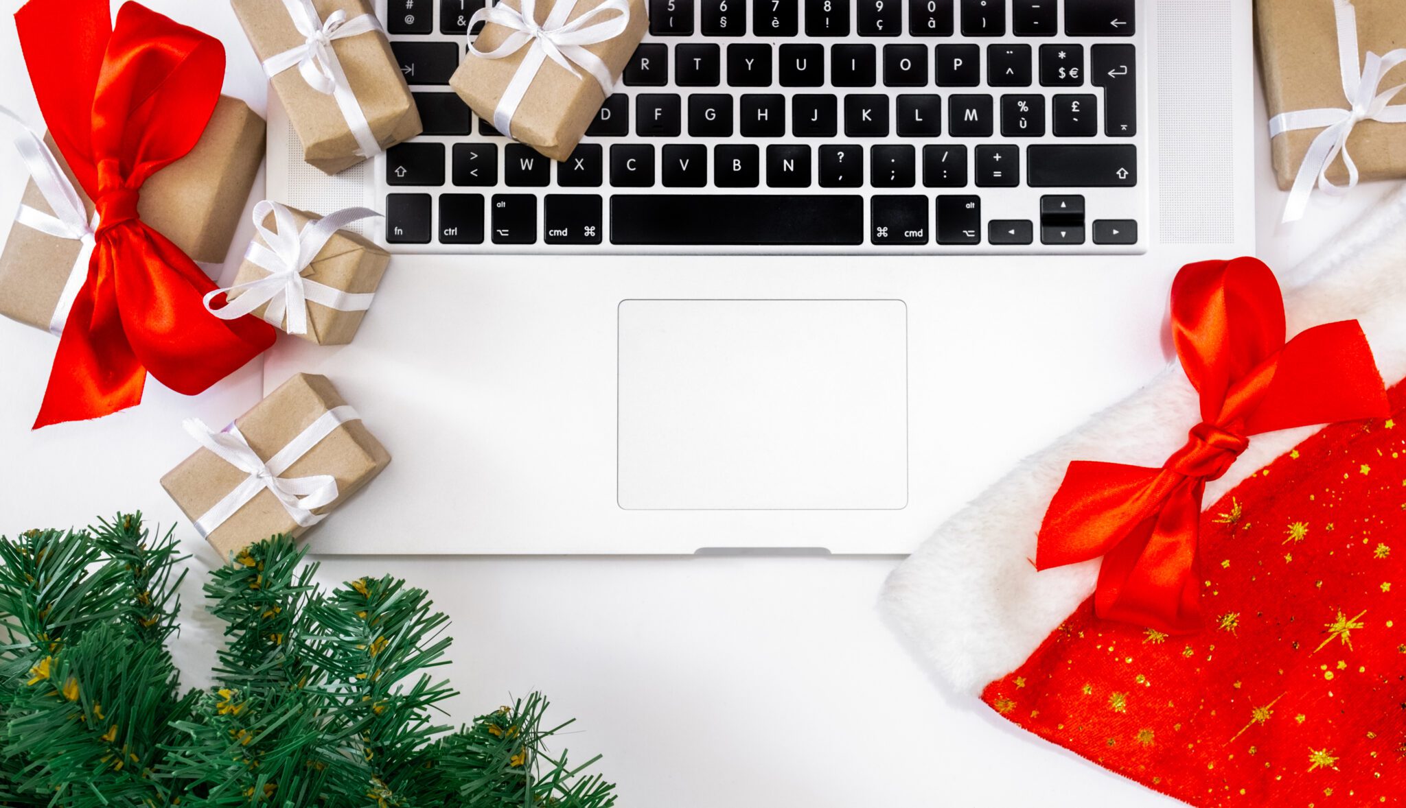 Laptop,With,Gifts,,Red,Hat,,Christmas,Tree,And,Packing,Boxes "Charity of the year" application form.