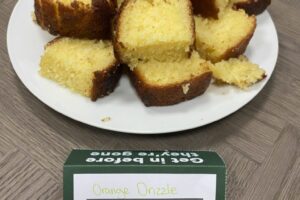 Orange Drizzle cake for MacMillan Bake Sale at Blue Whale Media 2022